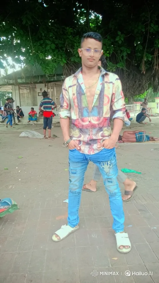 Confident Young Man Showcases Fashion in Outdoor Setting – AI Generated Video | Hailuo AI