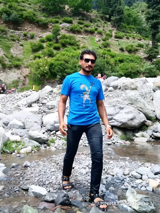 Man Walks Through Stream with Tracking Camera – AI Generated Video | Hailuo AI