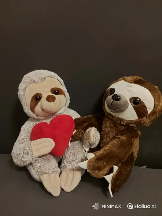 Cuddly Sloth Toys Share a Loving Moment – AI Generated Video | Hailuo AI