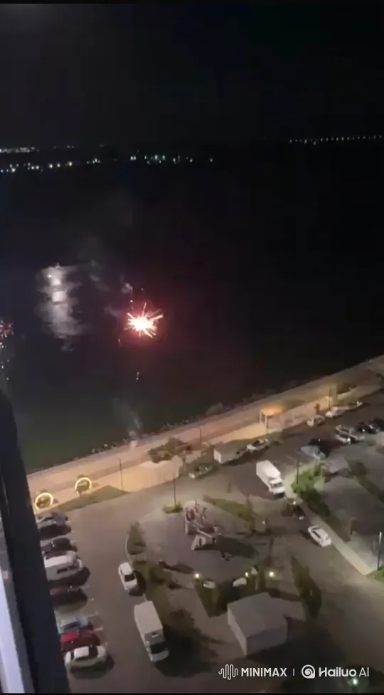 Nighttime Waterfront Fireworks Display – AI Generated Video | Hailuo AI