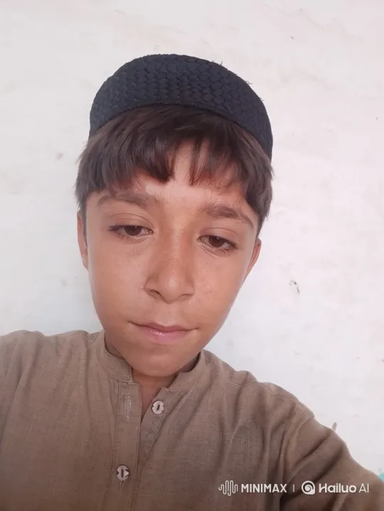 Boy's Pensive to Neutral Gaze Transition – AI Generated Video | Hailuo AI