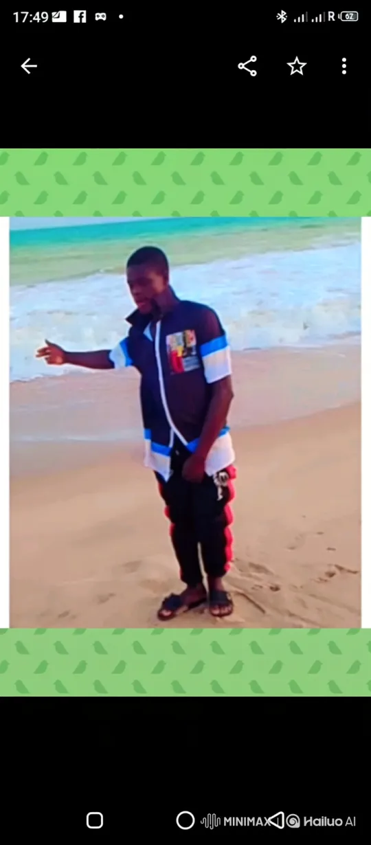 Young Black Man Contemplates Serene Ocean Shore – AI Generated Video | Hailuo AI
