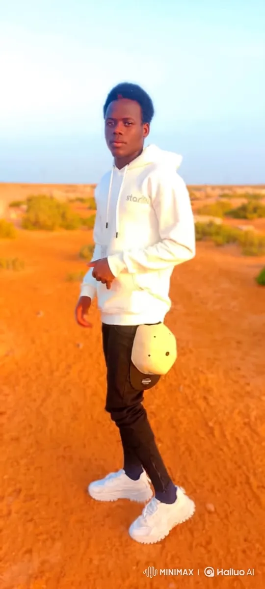 Contemplative Man in Desert at Sunset – AI Generated Video | Hailuo AI