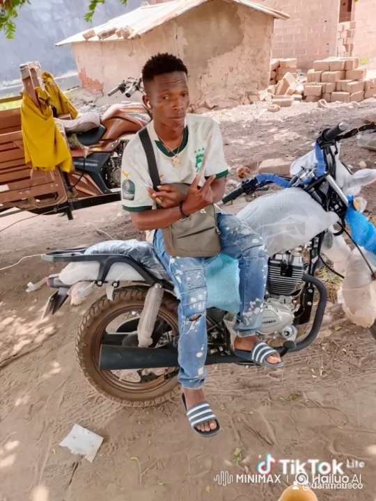 Confident Young Man on Motorcycle with Steady Gaze – AI Generated Video | Hailuo AI