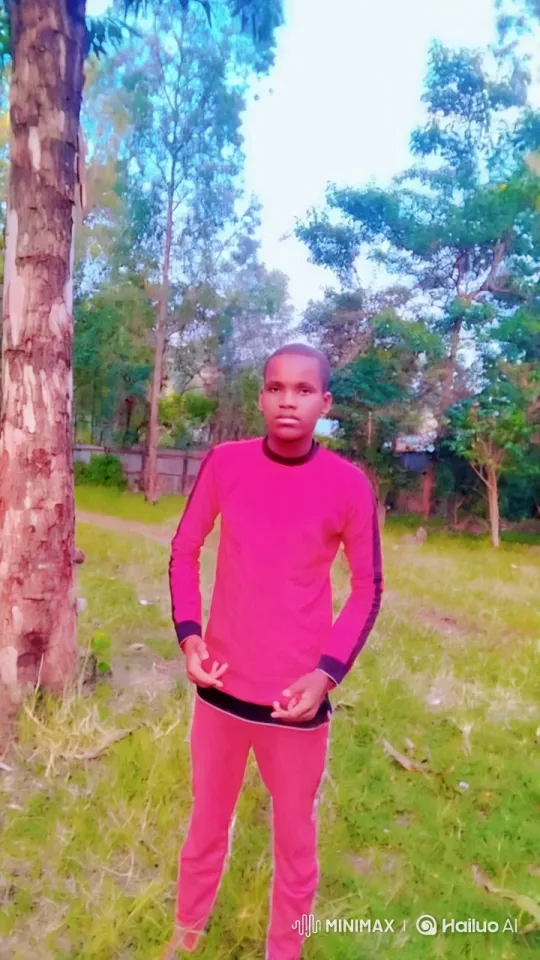 Young Person in Pink Tracksuit in Serene Outdoor Setting – AI Generated Video | Hailuo AI