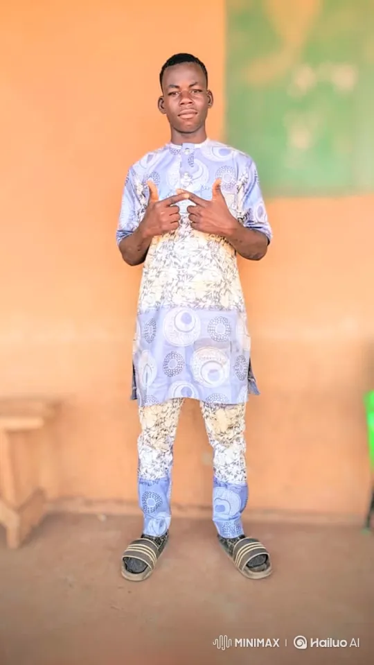 Young Man's Poised Transition in a Colorful Outfit – AI Generated Video | Hailuo AI