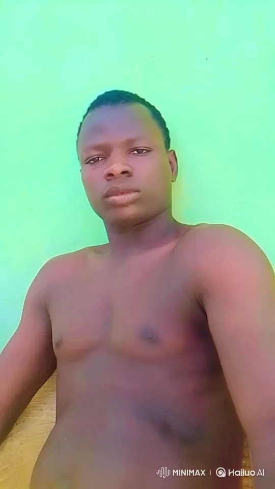 Tracking Shot of a Calm Man Against a Green Wall – AI Generated Video | Hailuo AI