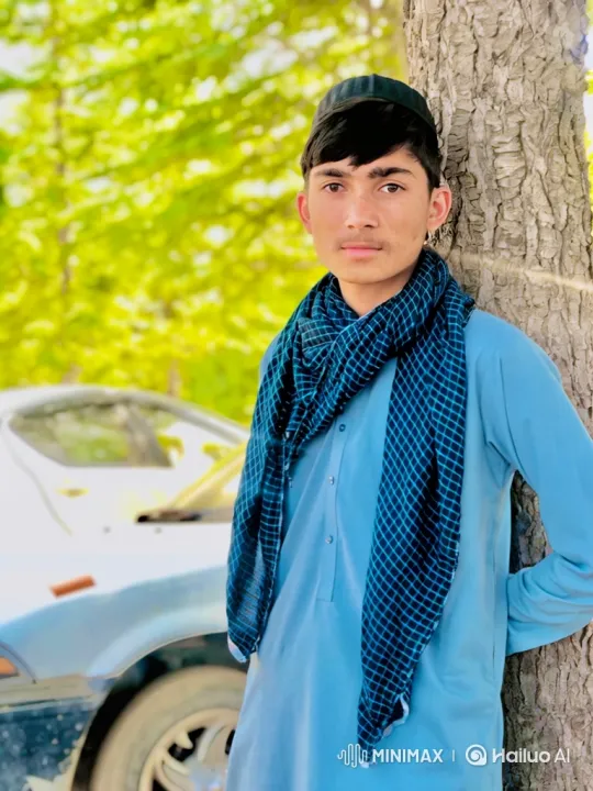 Young Man Explains with Gestures Against a Tree – AI Generated Video | Hailuo AI