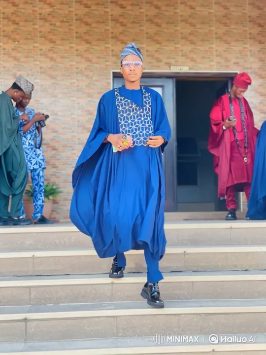 Young Man in Royal Blue Attire Enters Black Car – AI Generated Video | Hailuo AI