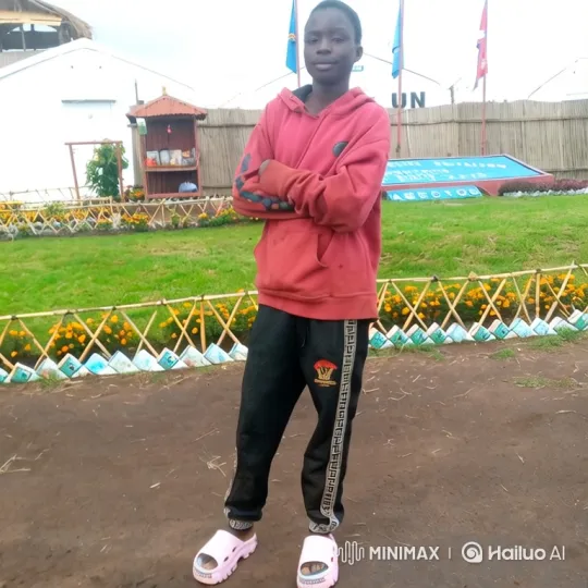 Young Person in Hoodie Stands Still, Eyes Camera – AI Generated Video | Hailuo AI