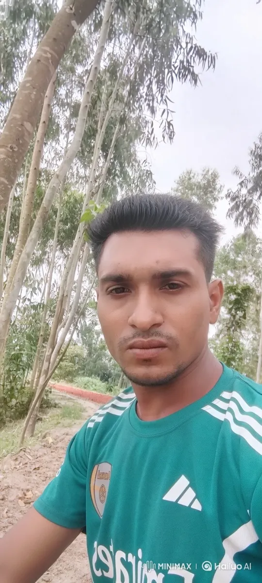 Young Man in Nature: Contemplative Stare Amidst Gentle Breeze – AI Generated Video | Hailuo AI