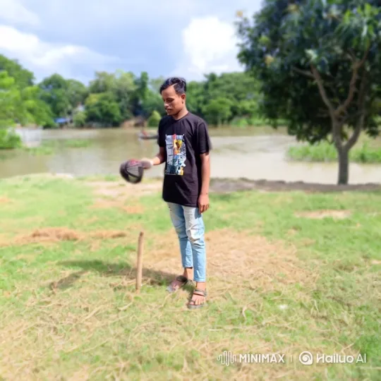 Young Man Reflects by a River, Contemplating with Cap – AI Generated Video | Hailuo AI