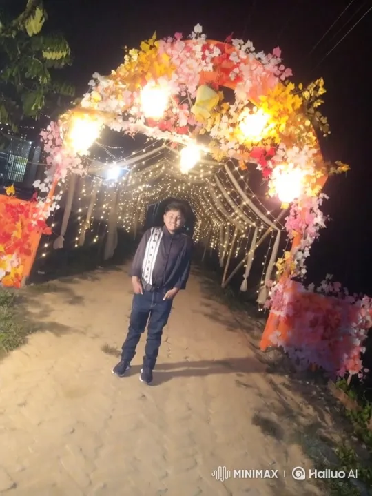 Young Person Smiles, Walks into Fairy-Lit Tunnel – AI Generated Video | Hailuo AI