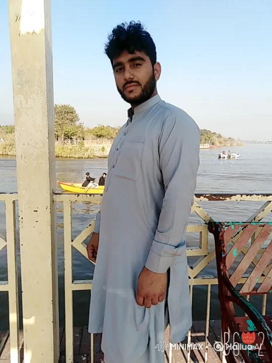 Young Pilot Prepares for Flight on River Pier – AI Generated Video | Hailuo AI