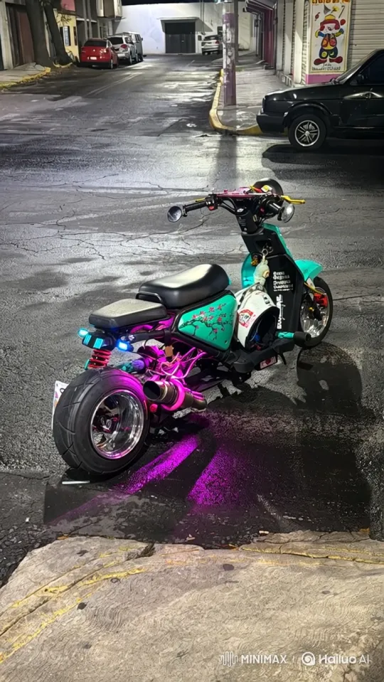 Nighttime Tracking Shot of Custom Scooter on Wet Street – AI Generated Video | Hailuo AI