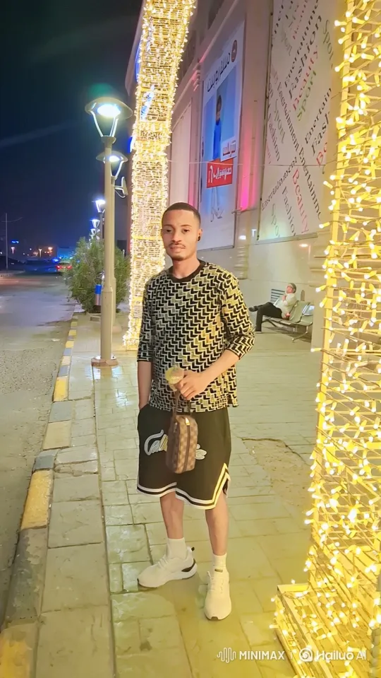 Young Man Enters Car on Nightlit Sidewalk – AI Generated Video | Hailuo AI