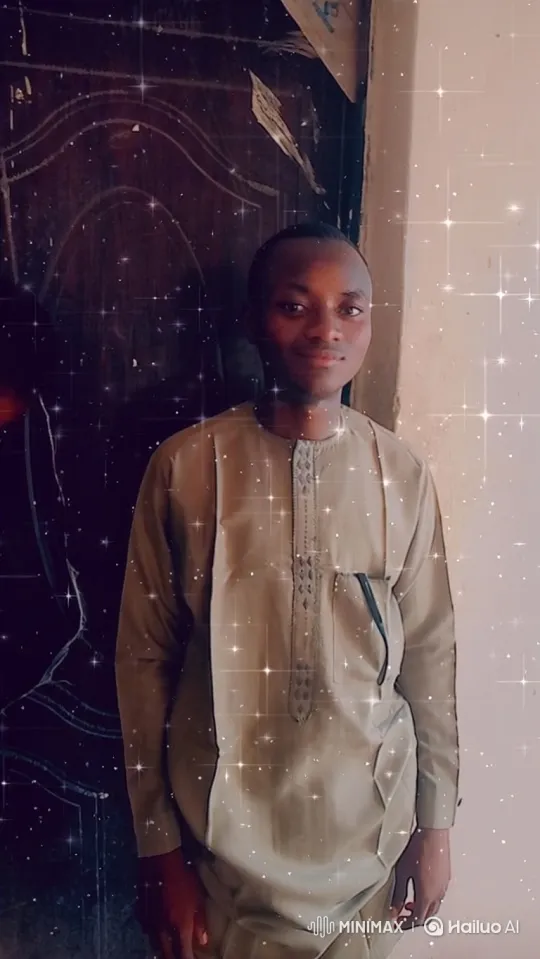 Young Man in Embroidered Shirt Amidst Sparkling, Serene Ambiance – AI Generated Video | Hailuo AI