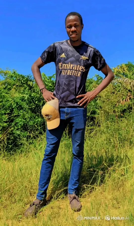 Young Man Enjoying Peaceful Day in Sunny Field – AI Generated Video | Hailuo AI