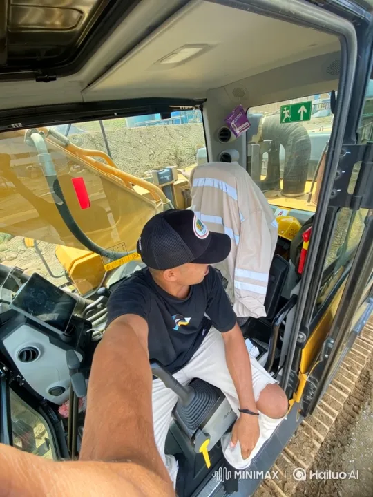 Young Man Prepares to Operate an Excavator – AI Generated Video | Hailuo AI