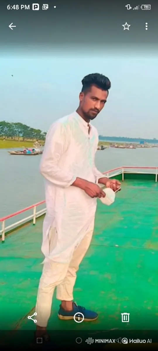 Young Man on Boat: Serene Dusk Reflection – AI Generated Video | Hailuo AI
