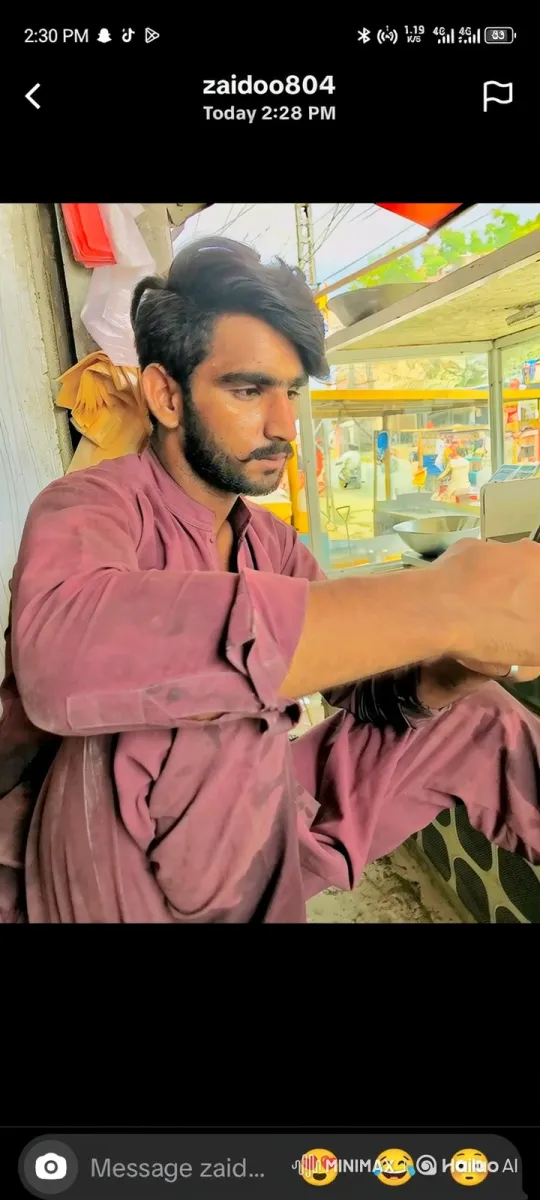 Young Man in Maroon Tunic Observes Busy Street – AI Generated Video | Hailuo AI
