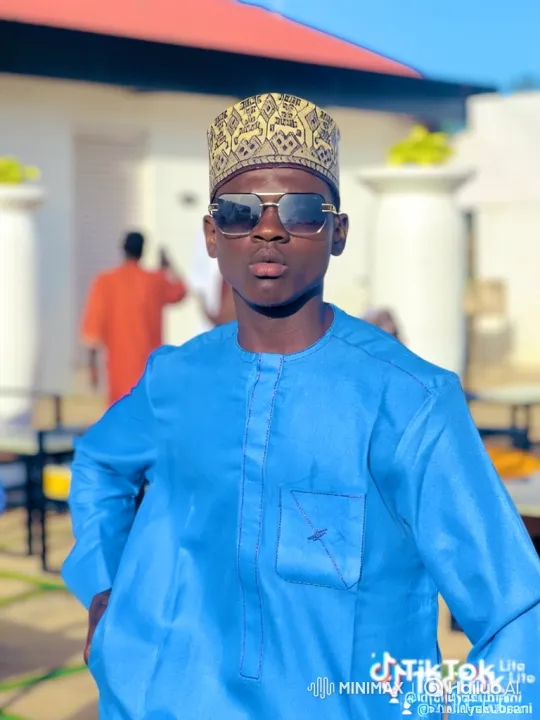 Stylish Young Man Poses Confidently in Slow Zoom – AI Generated Video | Hailuo AI