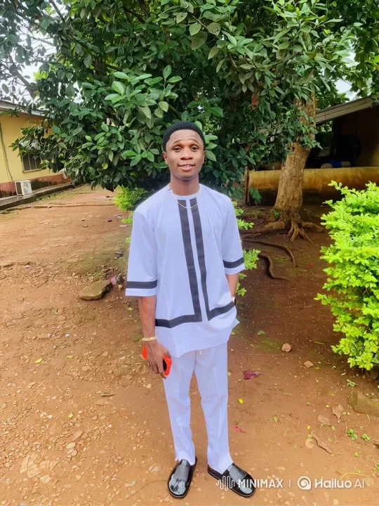 Young Man in White Striped Outfit with Car in Background – AI Generated Video | Hailuo AI