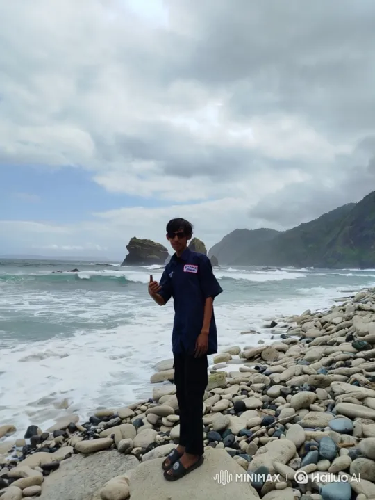 Young Man Poses Confidently on Shoreline Amid Dynamic Nature – AI Generated Video | Hailuo AI