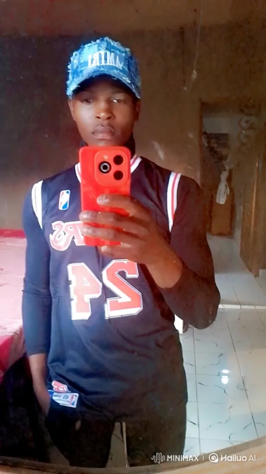 Young Man Prepares for Selfie in Tiled Room – AI Generated Video | Hailuo AI