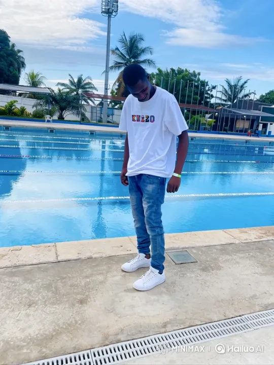 Young Black Man Reflects by the Poolside – AI Generated Video | Hailuo AI