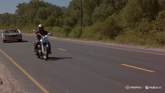 Motorcyclist Escapes Police Chase by Dropping Debris – AI Generated Video | Hailuo AI