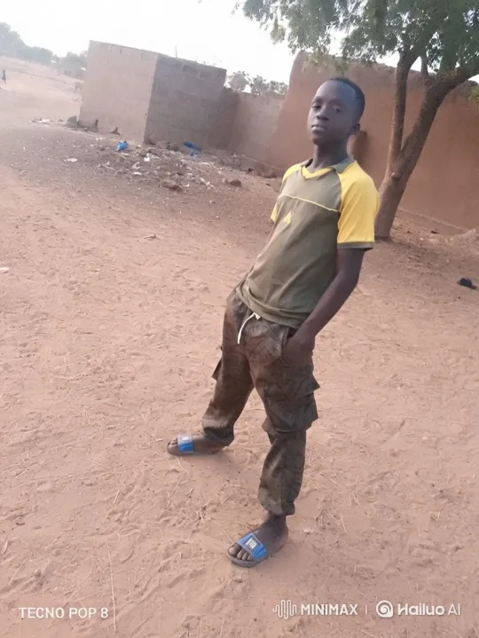 Young Boy in Rural Village: A Living Portrait – AI Generated Video | Hailuo AI