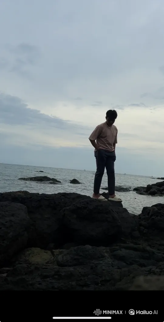 Contemplative Figure on a Shoreline to Earth from Space – AI Generated Video | Hailuo AI