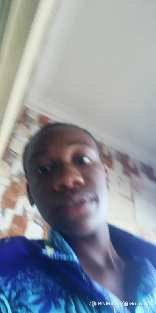 Young Person Settling Into Pose with a Gentle Smile – AI Generated Video | Hailuo AI