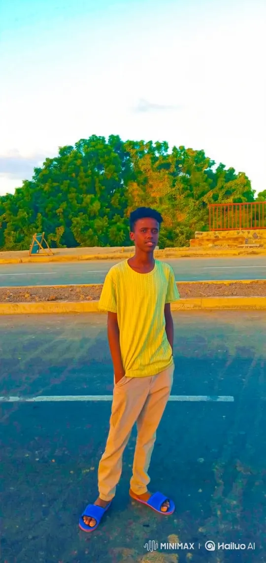 Young Man in Nature, Gazing at Camera – AI Generated Video | Hailuo AI