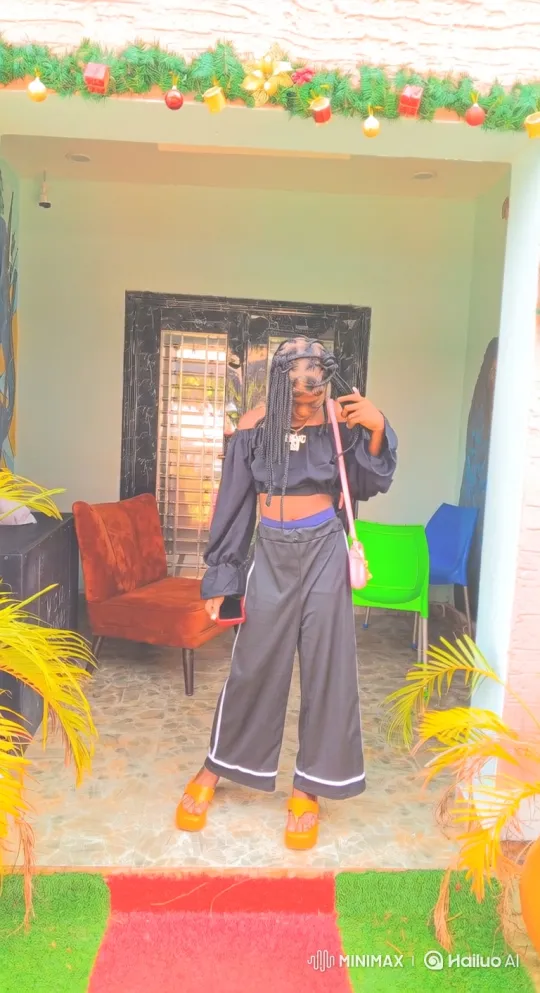 Young Woman Poses on Patio in Vibrant Outfit – AI Generated Video | Hailuo AI