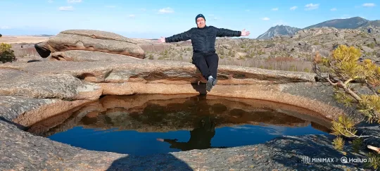 Man Dives, Leaps, and Lands on Distant Mountain Peak – AI Generated Video | Hailuo AI