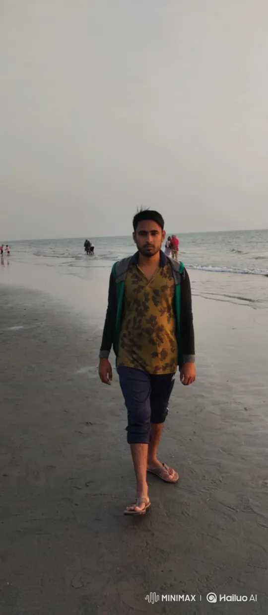 Young Man Walking on Beach with Tracking Camera Shot – AI Generated Video | Hailuo AI