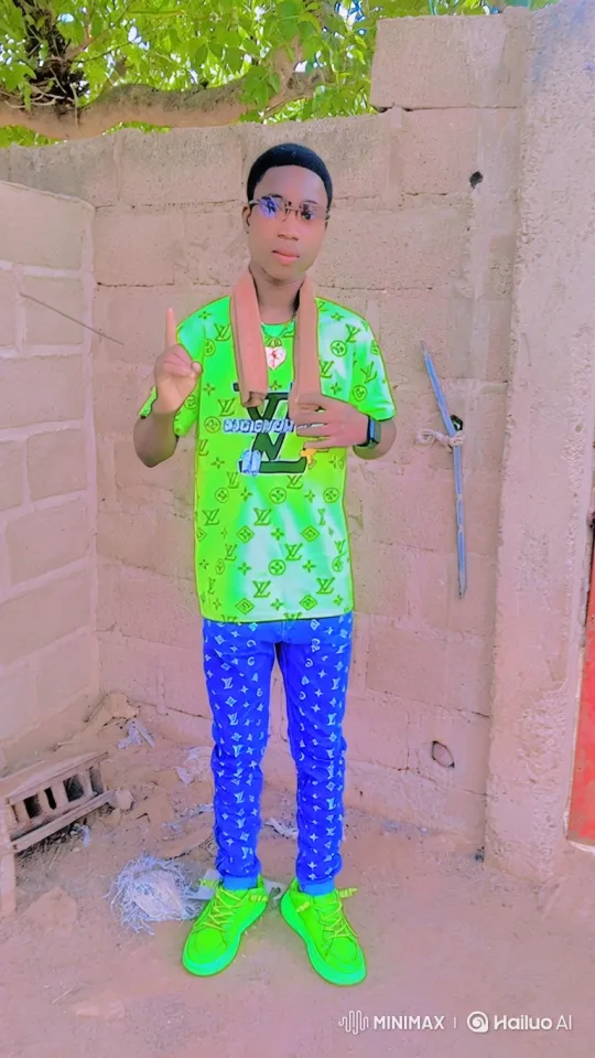 Young Man in Vibrant Outfit Poses Confidently – AI Generated Video | Hailuo AI