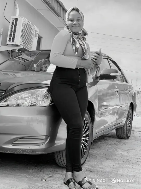 Young Woman Smiles, Leans Against Car in Overcast Weather – AI Generated Video | Hailuo AI
