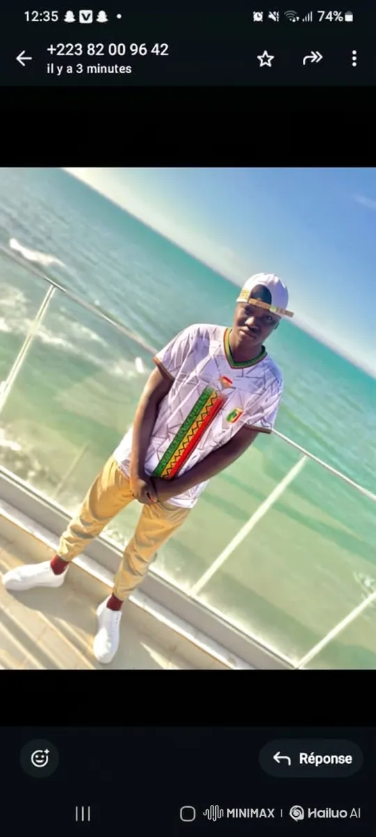 Young Man Enjoying a Serene Seaside View – AI Generated Video | Hailuo AI