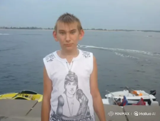 Boy on Pier Amidst Shaky Camera and Water Ripples – AI Generated Video | Hailuo AI