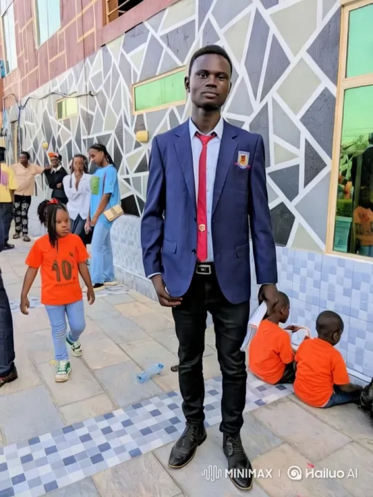 Confident Young Man in Formal Attire Amidst Colorful Children – AI Generated Video | Hailuo AI