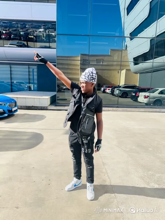 Young Man in Black Prepares to Drive Custom Sedan – AI Generated Video | Hailuo AI