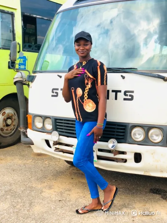 Young Woman in Casual Outfit Smiling on Bus Paved Surface – AI Generated Video | Hailuo AI