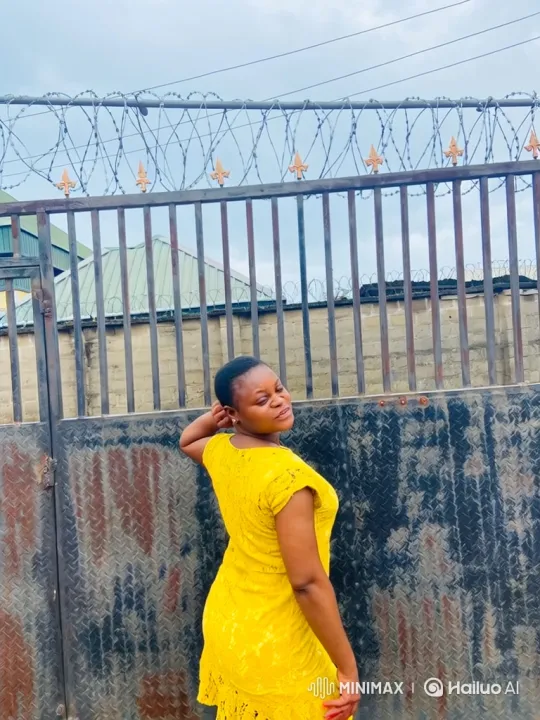 Young Woman in Yellow Dress Amidst Industrial Backdrop – AI Generated Video | Hailuo AI