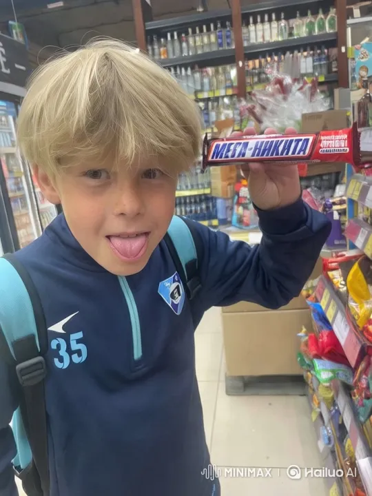 Boy Enjoys Chocolate in Vibrant Store Aisle – AI Generated Video | Hailuo AI