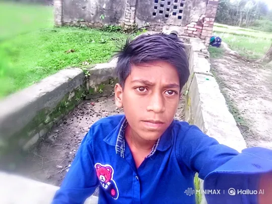 Young Boy in Rural Setting with Ascending Camera Perspective – AI Generated Video | Hailuo AI