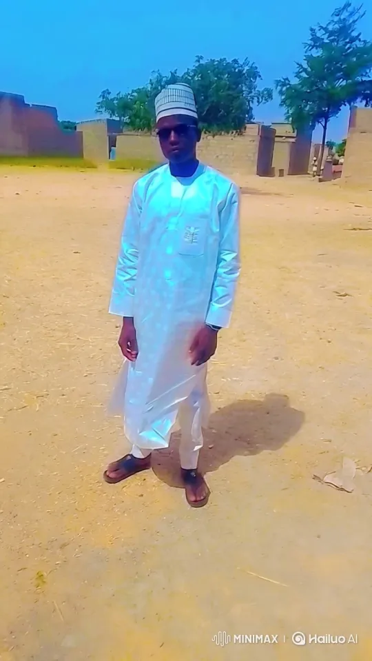 Man in White Stands in Sunlit Landscape – AI Generated Video | Hailuo AI