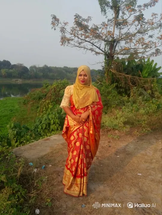 Woman in Traditional Attire on Nature Path with Gentle Breeze – AI Generated Video | Hailuo AI